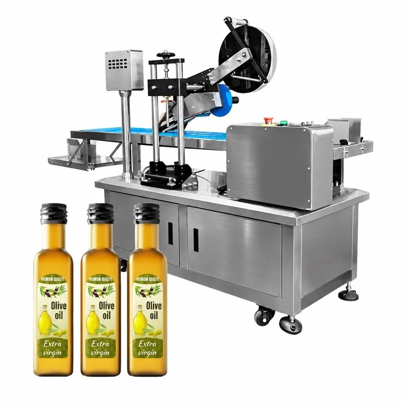 Flat-surface labeling machine with label reel and blue conveyor, olive-oil bottles in front
